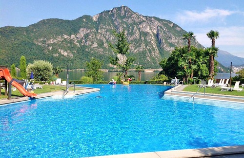 Bissone Apartment | Nice apartment for 4 guests with pool, A/C, WIFI, TV, balcony and panoramic view