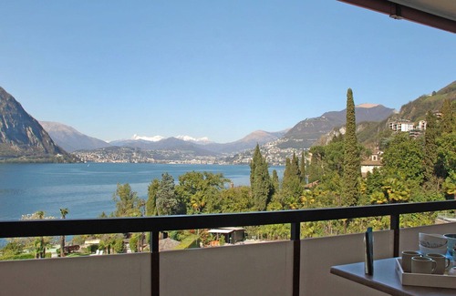 Bissone Apartment | Nice apartment for 4 guests with pool, A/C, WIFI, TV, balcony and panoramic view