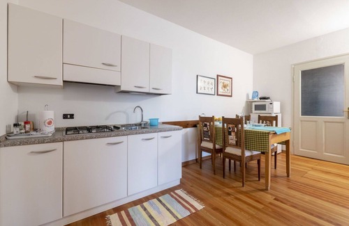 Vito d'Asio Apartment | Nice apartment for 4 guests with pool, WIFI, TV, patio, pets allowed and parking