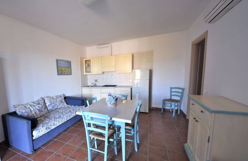 Follonica Apartment | Nice apartment for 6 people with pool, A/C, TV, patio and pets allowed