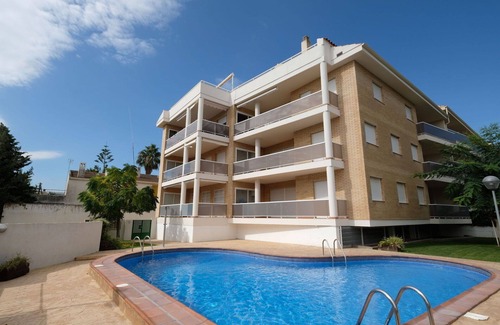 Alcanar Apartment | Nice apartment for 8 people with WIFI, A/C, pool, TV, balcony and parking