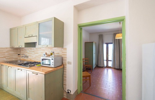Montebonello Apartment | Nice apartment for 4 people with A/C, pool, WIFI, TV, pets allowed, panoramic view and parking
