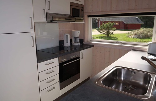Grossenbrode House | Nice apartment in villa for 6 guests with WIFI, TV, terrace and pets allowed