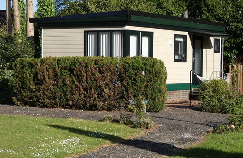 Marum Cabin | Nice chalet for rent against forest and directly on border Friesland/Groningen/Dr.