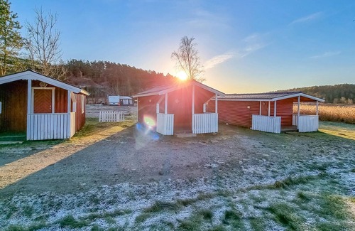Stromstad O House | Nice small wooden cottage on natural plot by the sea fjord.