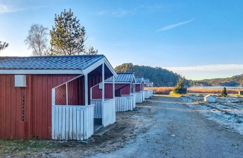 Stromstad O House | Nice small wooden cottage on natural plot by the sea fjord.