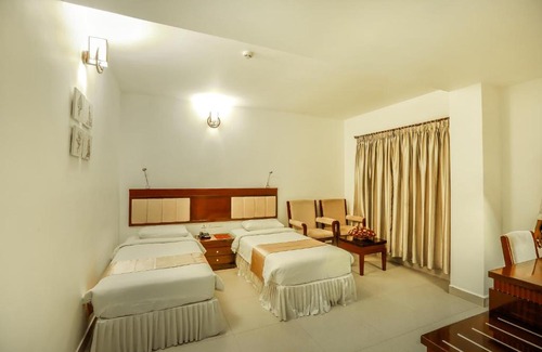 Thrippunithura Hotel | NM Royale County
