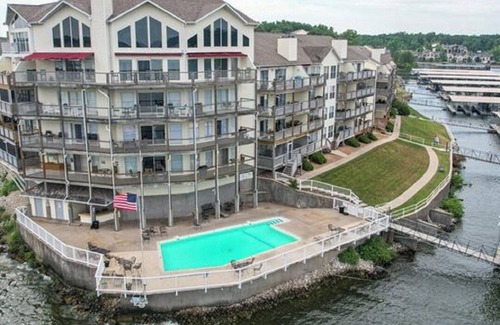 Osage Beach Condo | No Stairs, 2 Pools, Sand Beachn