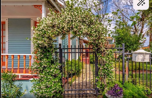 San Jacinto Cottage | Notable Galveston Cottage just steps to Seawall Beaches, Sunrises & Attractions.