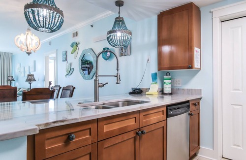 Fort Walton Beach Condo | 🦩Now Booking for Summer! Incredible Poolside! Waterscape A108 Courtyard Walk-Out🦩