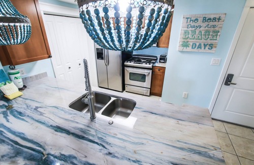 Fort Walton Beach Condo | 🦩Now Booking for Summer! Incredible Poolside! Waterscape A108 Courtyard Walk-Out🦩