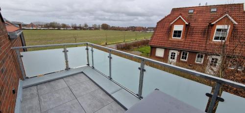 Carolinensiel Apartment | Nr 92 - Ferienwohnung "Deichkoje" Am Schlafdeich