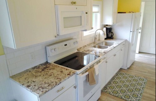 Ludington Cottage | OAK - Grace Landing Cottages With Stunning Sunsets Over Hamlin Lake