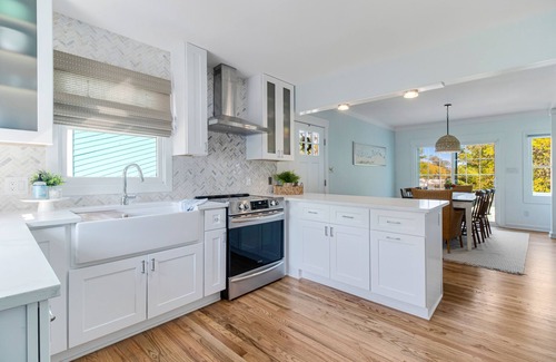 Long Beach House | Oak Island home on the Davis Canal with private boat dock.