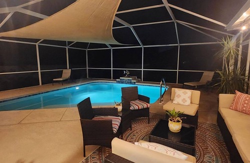 Pelican House | Oasis: 3-bedroom house with POOL and beautiful Screened back patio in Cape Coral
