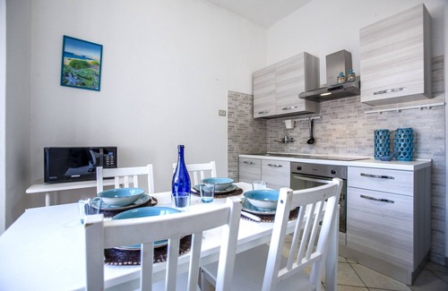 Porto Pino Apartment | Oasis home, just steps from Porto Pino long beach