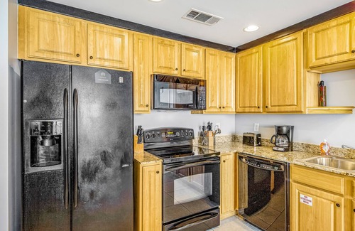 West Panama City Beach Condo | Ocean and breachfront condo with pool, gym, hot tub - walk to the beach