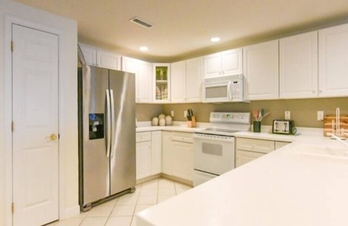 North Ocean City Condo | Ocean Block, porch, jacuzzi tub, indoor pool, sauna, gym! Steps from the beach!