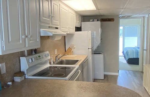 Midtown Ocean City Condo | Ocean block steps from the beach across the street from the Convention Center