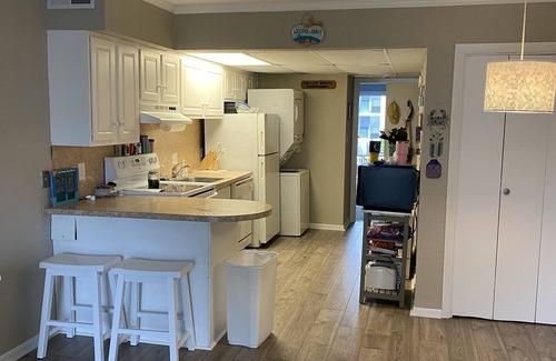 Midtown Ocean City Condo | Ocean block steps from the beach across the street from the Convention Center