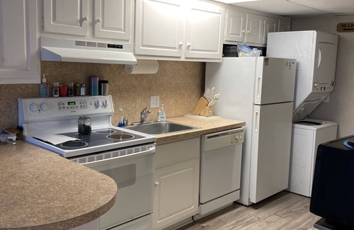Midtown Ocean City Condo | Ocean block steps from the beach across the street from the Convention Center