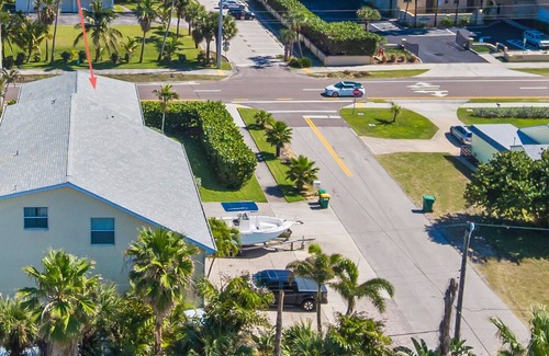 Snug Harbor Estates House | Ocean Blue Beach House - Steps from the Beach, featuring 2 KING Main Bedrooms
