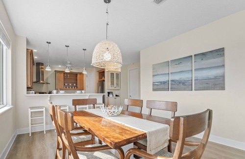 Snug Harbor Estates House | Ocean Blue Beach House - Steps from the Beach, featuring 2 KING Main Bedrooms