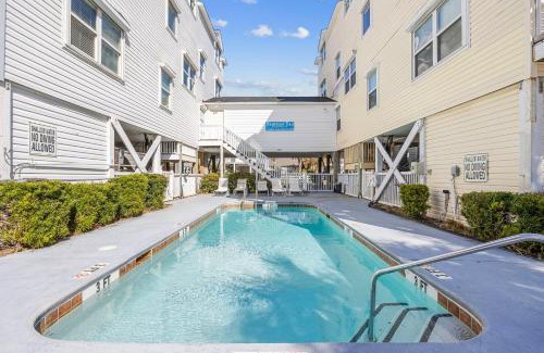 Crescent Beach House | Ocean Breeze Getaway with Pool, Game Room & Decks by myBeach Vacation Rentals