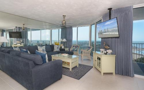 Bethune Beach Apartment | Ocean Condo 104 ~ Ground Floor Corner Condo with wrap around balcony Walk right out to Pool