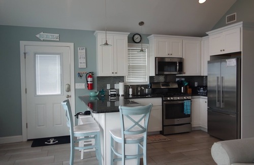 Ocean Beach III House | Ocean Front Beach House - Steps to Beach - Hot Tub, Deck, 3BR, 2Bath, AC, Badges