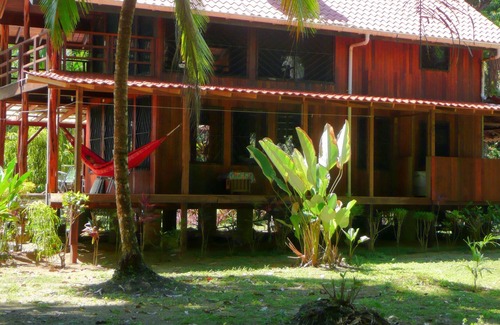 Carate House | Ocean front beach home, lagoon sunrise, Corcovado sunset, wildlife, kayaks, WIFI