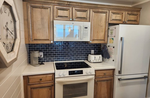 Panama City Beach Condo | Ocean Front Condo at Edgewater w/Private Balcony and free Beach Chairs