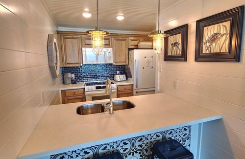 Panama City Beach Condo | Ocean Front Condo at Edgewater w/Private Balcony and free Beach Chairs