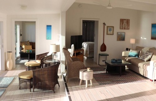 Kamuela House | Ocean front cottage with beach access from patio.