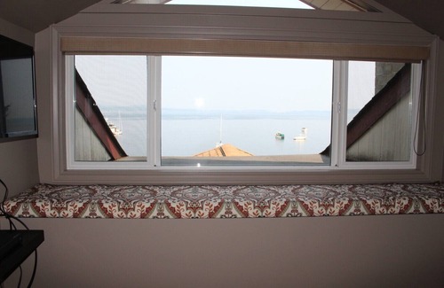 Mill Bay House | Ocean-Front/Ocean Access lovely spacious bedroom with kitchenette & lounge area