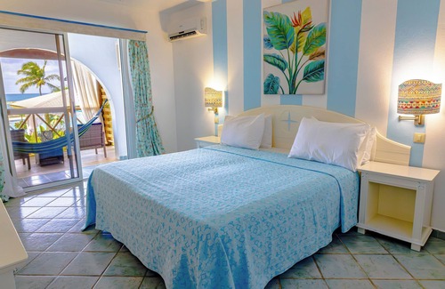 Dickenson Bay Hotel | Ocean Point Beach Resort & Spa - Adults Only