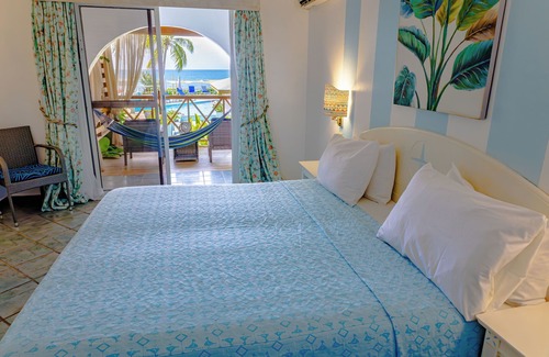 Dickenson Bay Hotel | Ocean Point Beach Resort & Spa - Adults Only