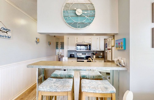 Ocean Drive Condo | Ocean-view condo, 1 block from beach with enclosed balcony & pool