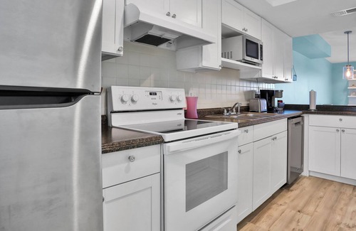 South Patrick Shores Condo | Ocean-view condo with balcony, pool, central AC & WiFi - snowbirds welcome