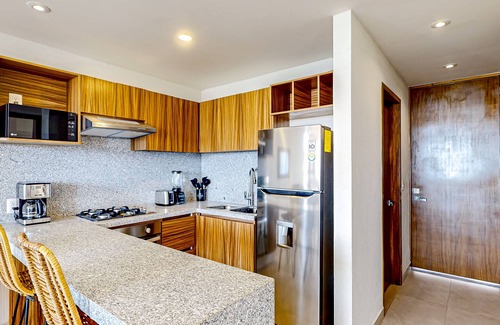Bucerias Apartment | Ocean-view condo with infinity pool, rooftop lounge, & private balcony