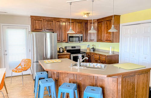 Surf City House | Ocean-view home 1 block from the beach with covered deck, patio, & EV charger