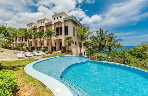 Playa Flamingo Condo | Ocean View Retreat with Sunsets & 2 Pools