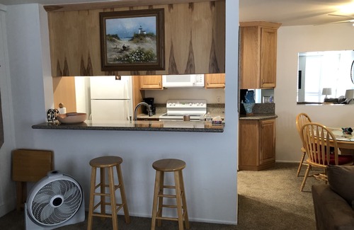 Townsite Condo | Ocean View - Steps from the Sand - Cottage Unit
