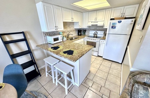 Miramar Beach Condo | Ocean view, steps from the Beach! 205 SB