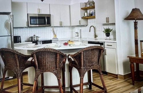 The Bight Condo | Ocean view luxury on 2 levels. Coral Gardens at snorkel reef on Grace Bay Beach