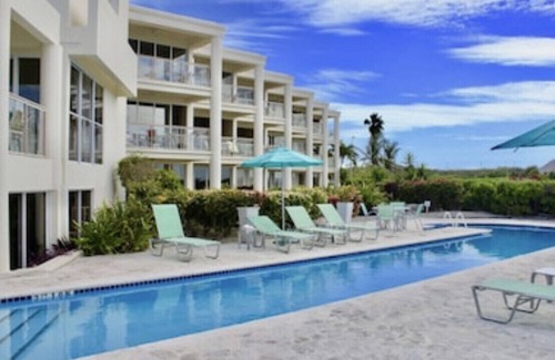 The Bight Condo | Ocean view luxury on 2 levels. Coral Gardens at snorkel reef on Grace Bay Beach
