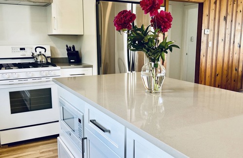 Montauk Cottage | Ocean View White Cottage Walk to Town, Beach Pass Included