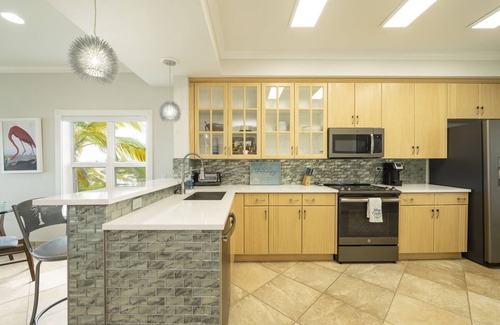 Key West Condo | Oceanfront 3 bedroom gated Condominium adjacent Marina, and Restaurant.