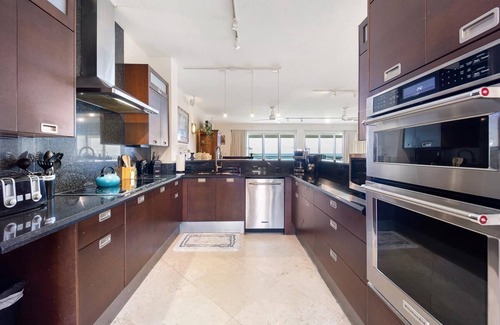 Rock Harbor Condo | Oceanfront 4BR/3BA Mariner's Club Villa 535 with Oasis Pool, Marina, Game Room & More