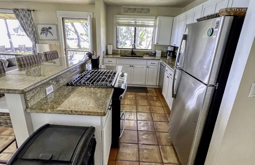 Poipu Cottage | Oceanfront Beach Home w/Hot Tub, EV Charger – Steps to Poipu Beach Park!